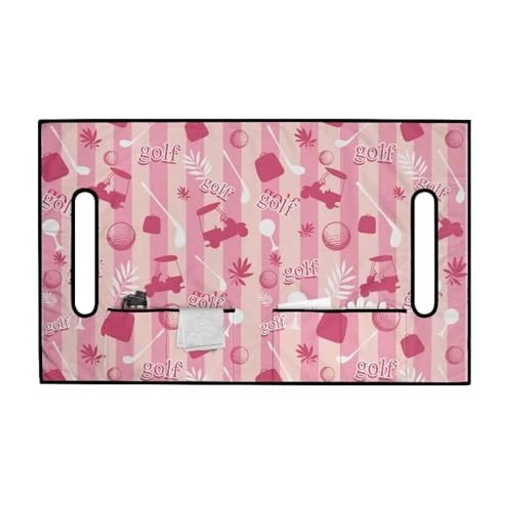 Rectangular pink golf cart seat cover towel with golf pattern and handle cutouts at sides