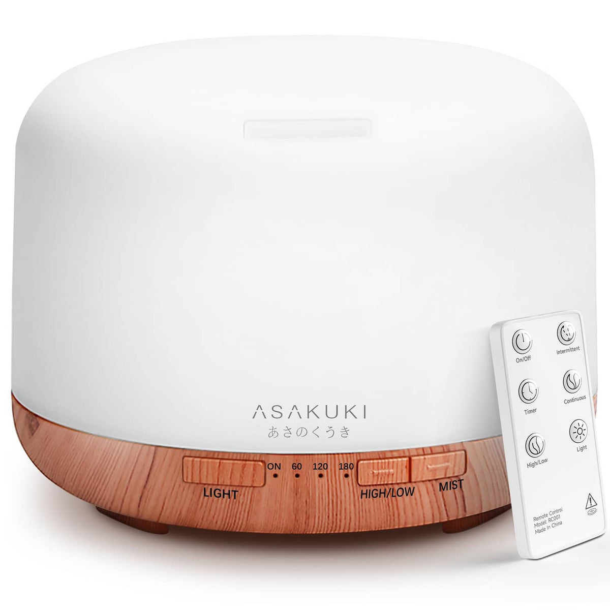 White and wood essential oil diffuser with remote control at side