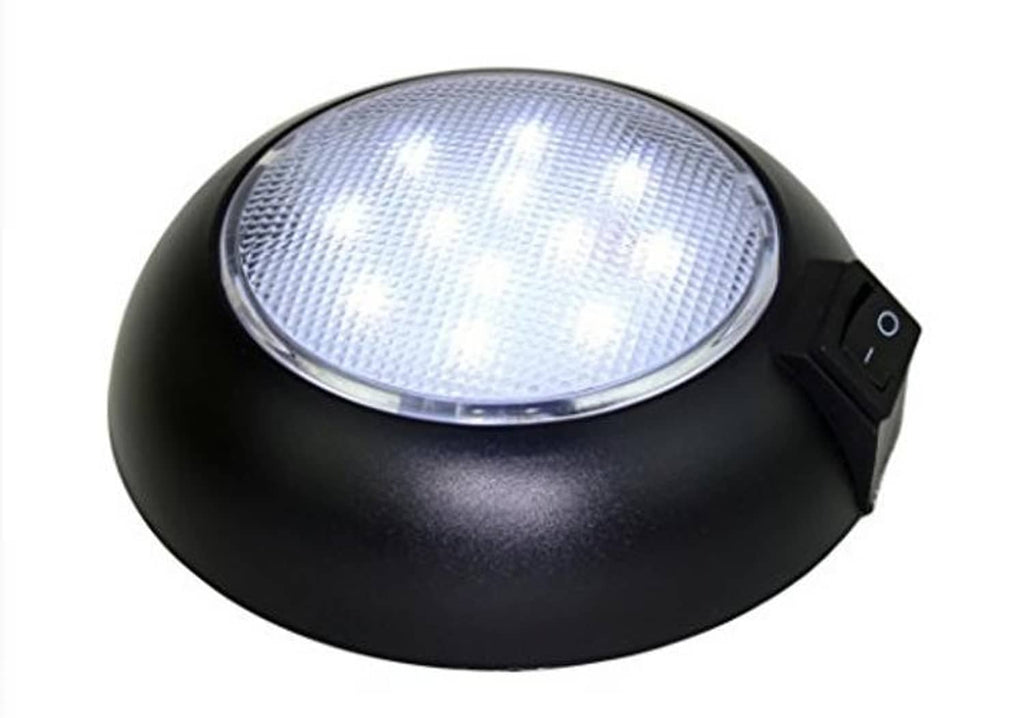 Black dome LED light with cool white lens and rocker switch on the side