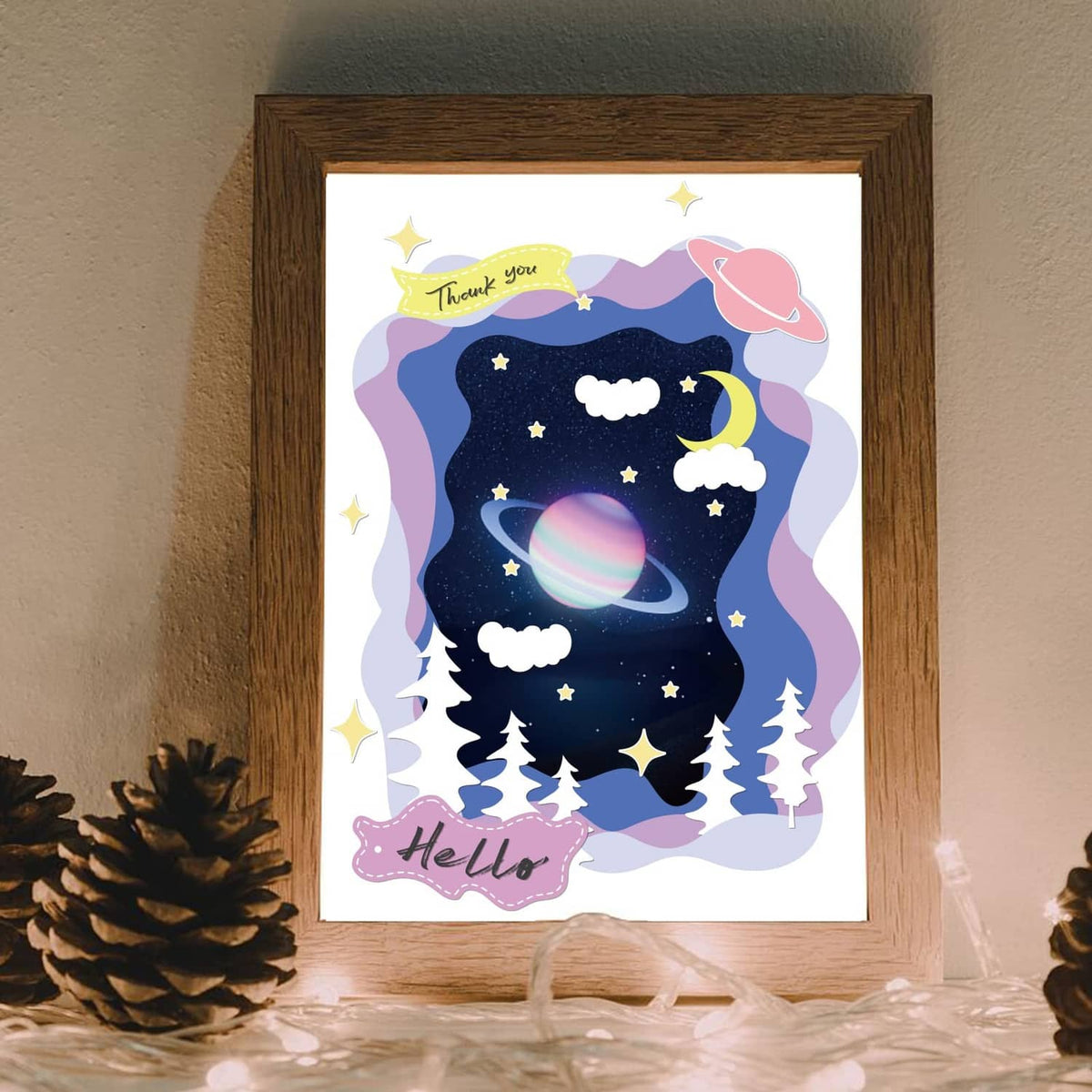 Framed layered greeting card with moon, stars, and trees design