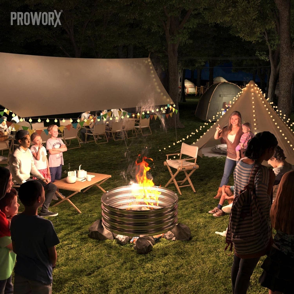 Outdoor galvanized fire pit ring burning during a nighttime backyard gathering