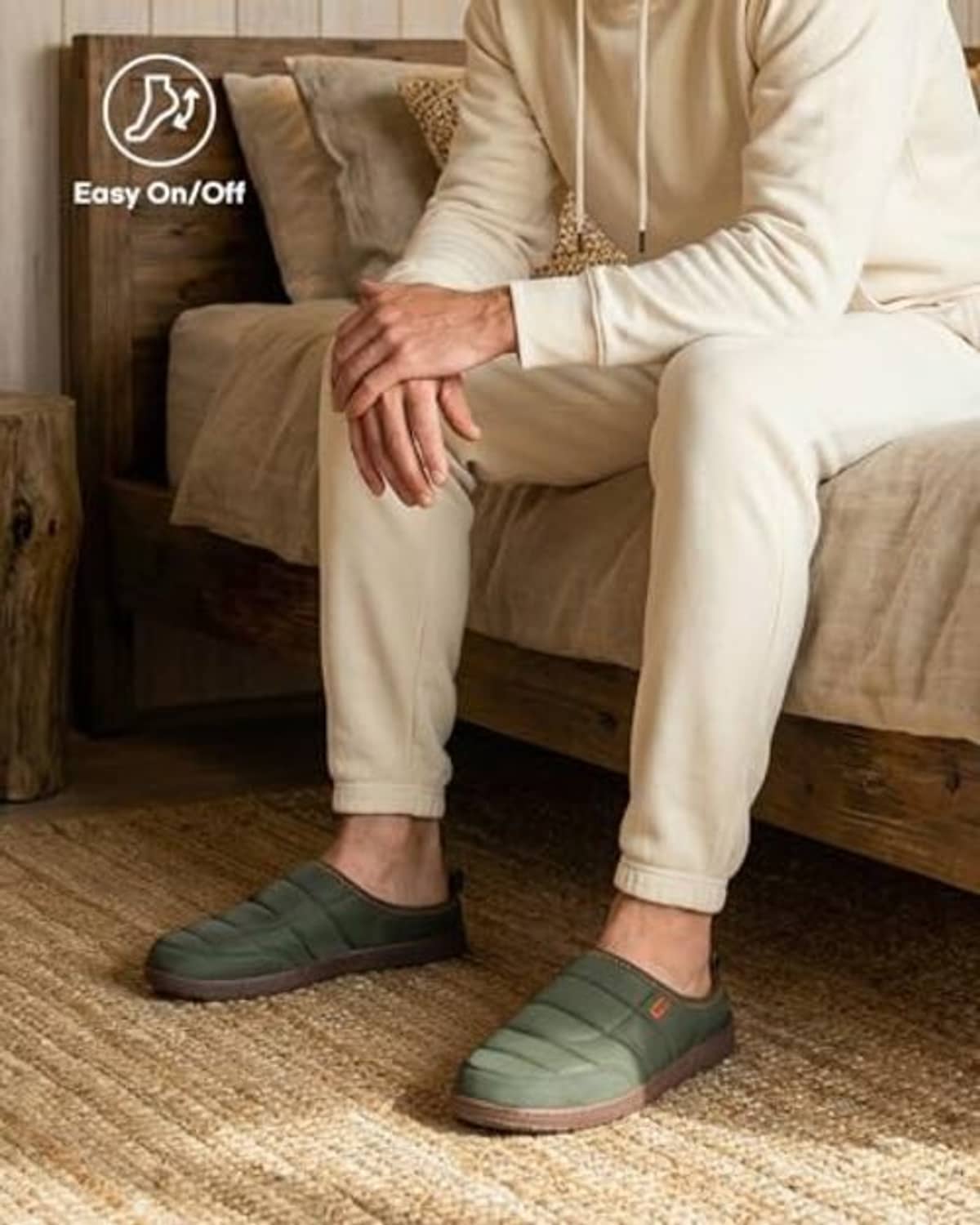 Men's slip-on house shoes, dark green with brown trim, worn indoors