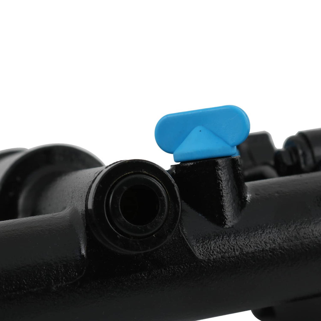Close-up of black pump housing with blue service tab and side outlet opening