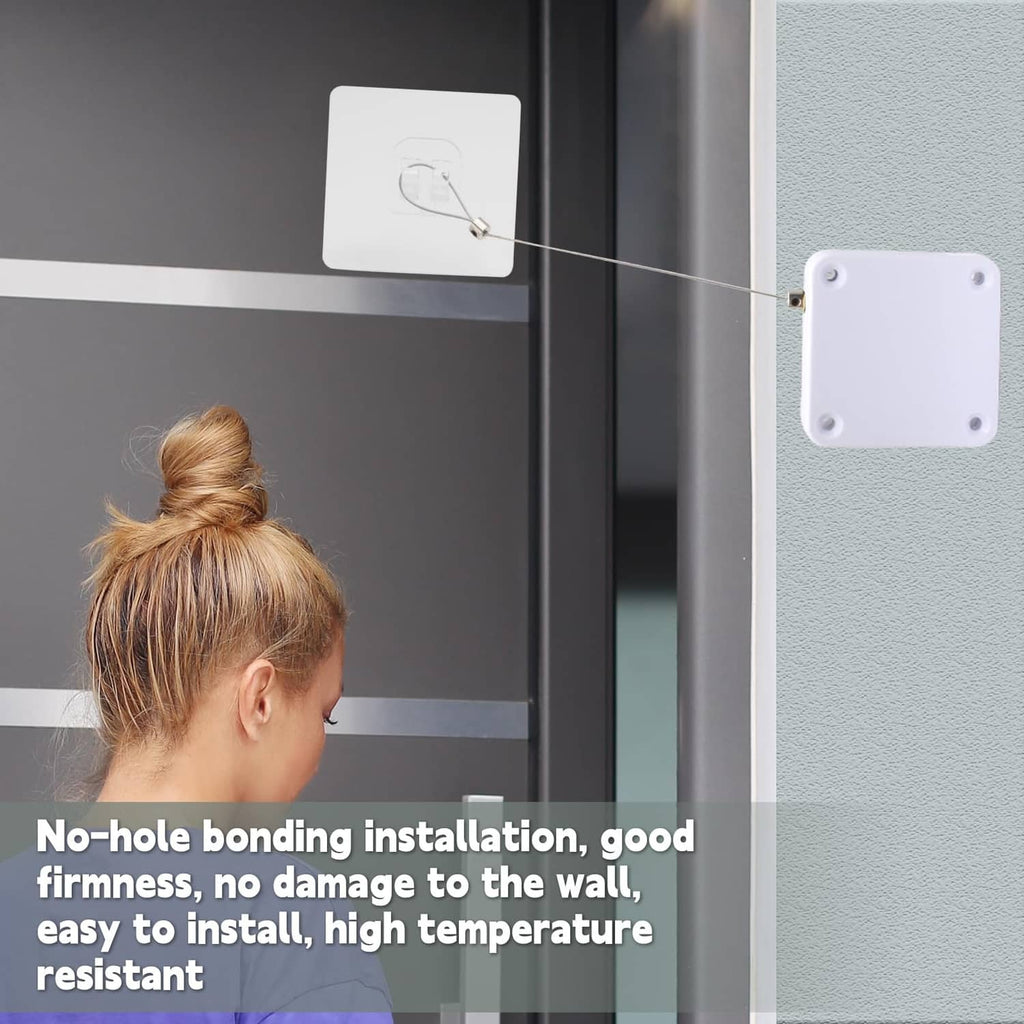 White wall-mounted sliding door closer with tether line attached to door frame