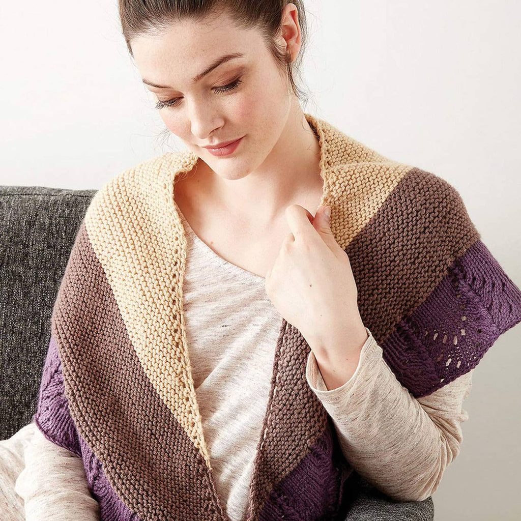 Two-tone knit shawl with openwork pattern, tan body and purple/brown outer bands.