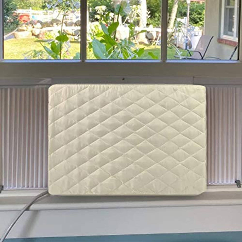 Cream quilted AC cover stretched over window AC between blinds