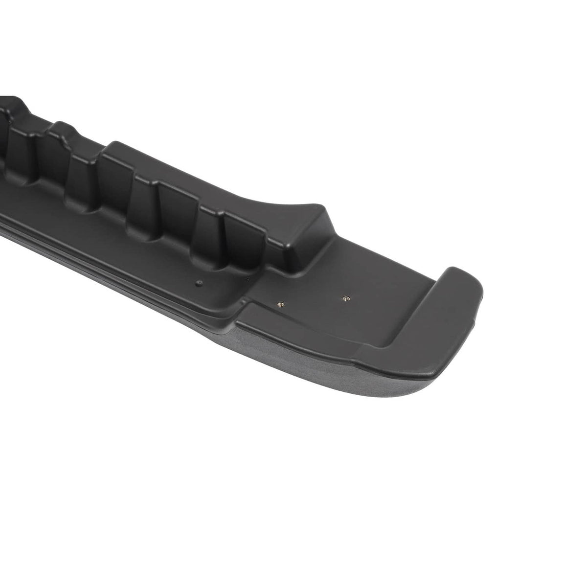 Dark gray bumper underside with segmented ridges, mounting points, and lip
