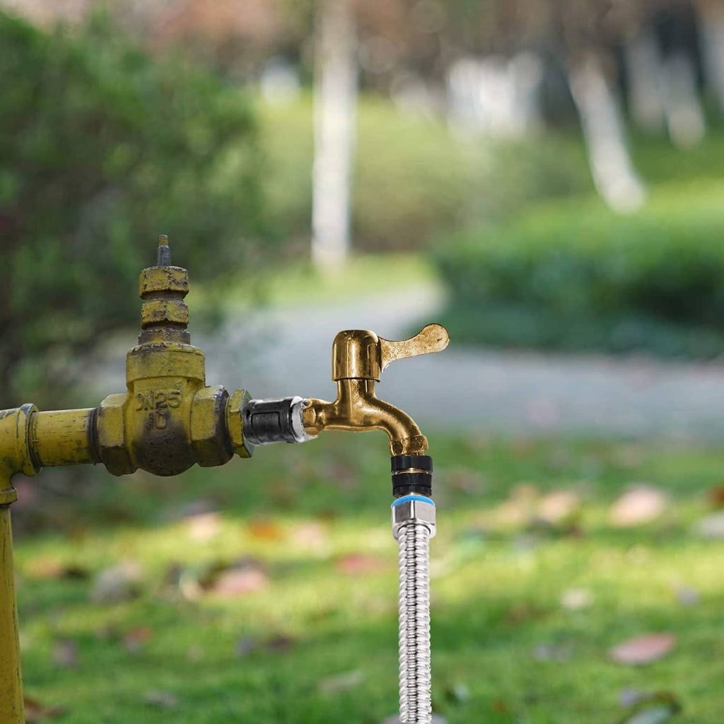 Gold quick hose connector on a garden spigot with braided hose and black seals
