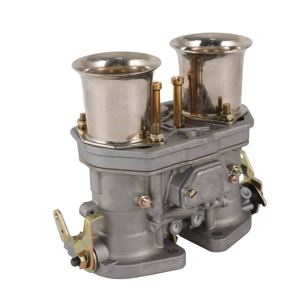 Dual-barrel carburetor assembly with two round air inlets and silver-gray housing