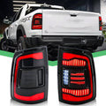 Smoked LED rear tail light pair with red light bars and clear reverse section