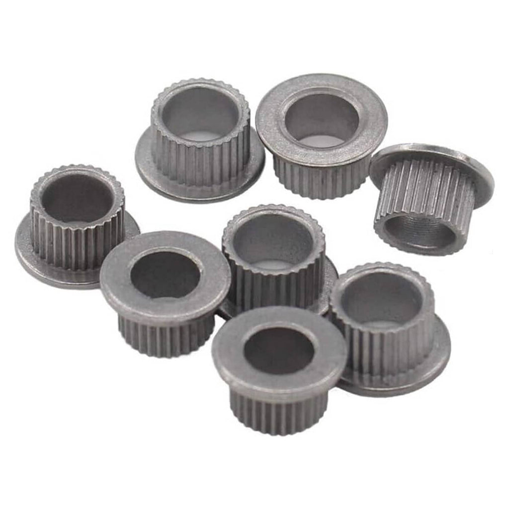 Door hinge pin bushing repair kit includes gray grooved bushings with central openings