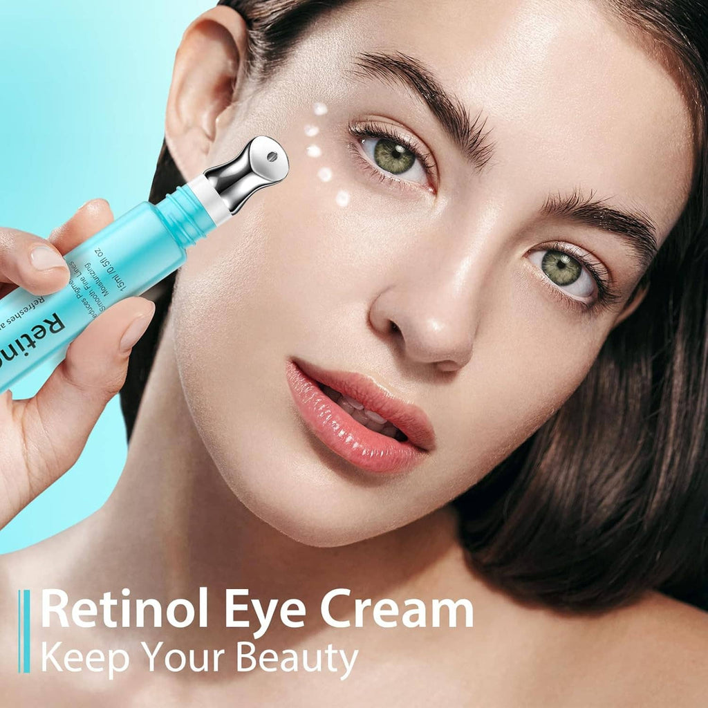 Retinol eye cream tube held near a woman’s face with cream dots on skin