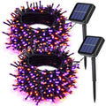 Halloween solar string lights with purple and orange LED bulbs, black wire, 2 solar panels