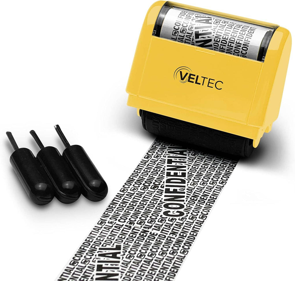Yellow roller stamp and four black ink cartridges with identity text strip