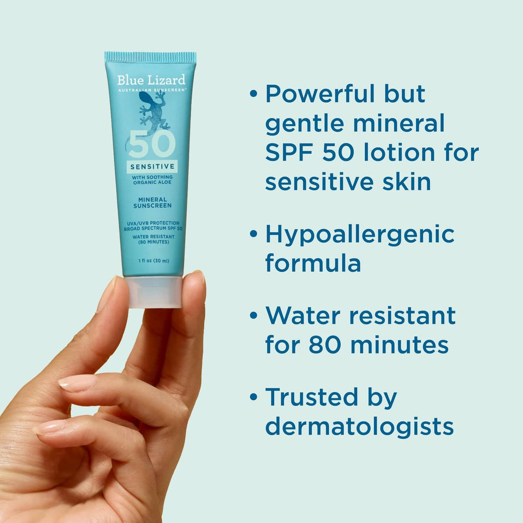 Mineral SPF 50 sensitive sunscreen lotion tube held in hand, 1 fl oz.