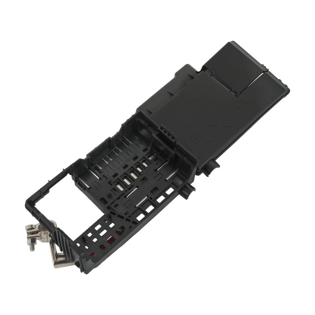 Battery fuse box terminal with cover, angled view of black internal fuse slots