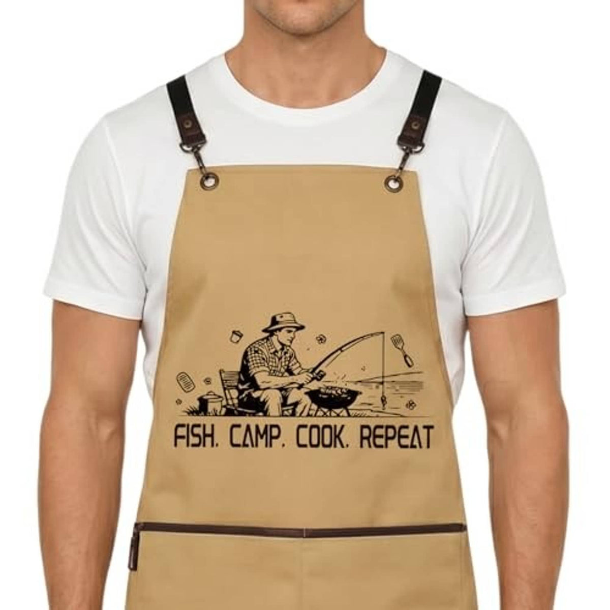Khaki apron with dark crossback straps and “FISH. CAMP. COOK. REPEAT” graphic.