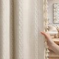 Beige linen-look blackout curtains with braided vertical pattern and tassel fringe border