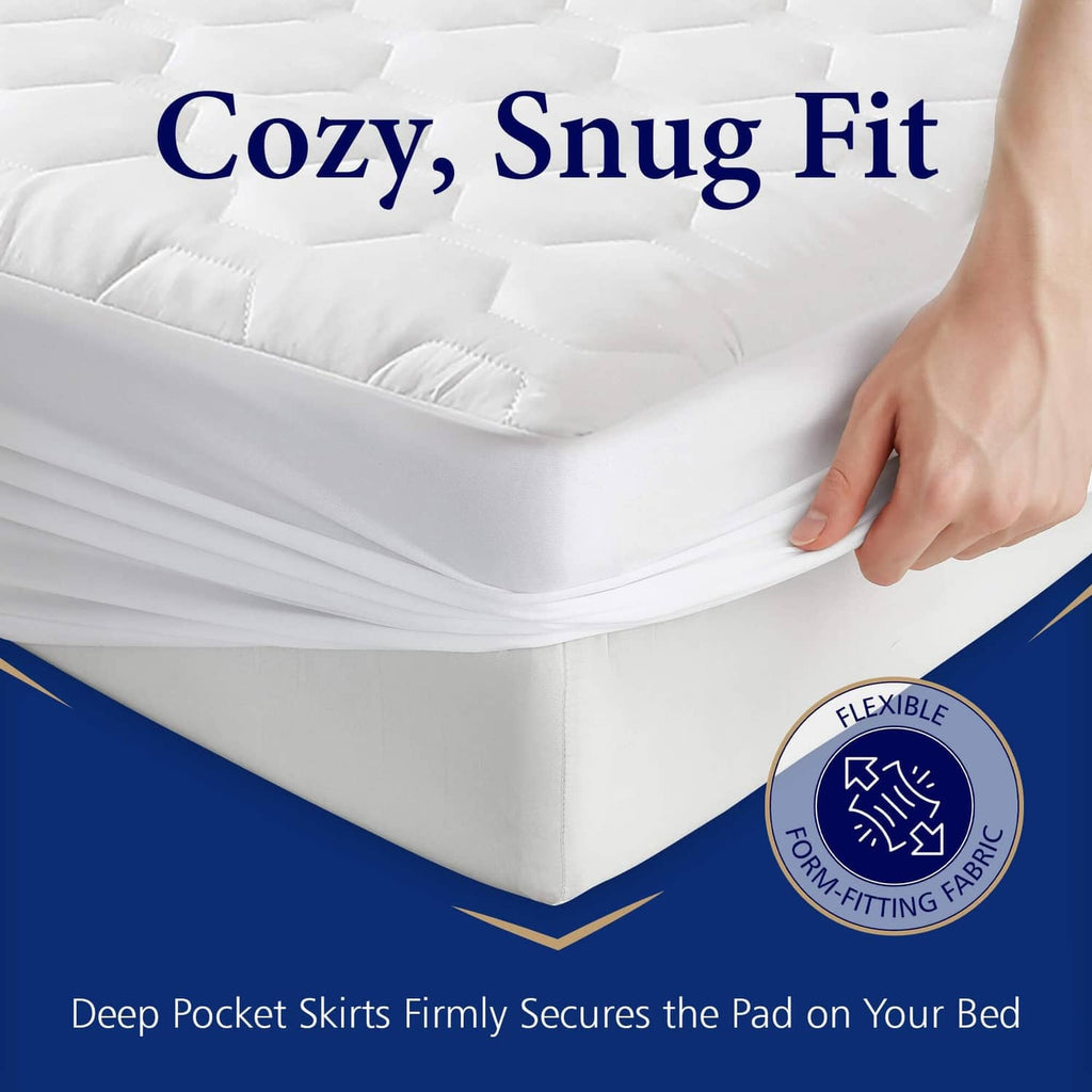 White mattress pad protector with deep-pocket skirt, hand tucking the corner