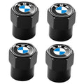 Black tire valve stem caps, set of four, with BMW logo on round tops
