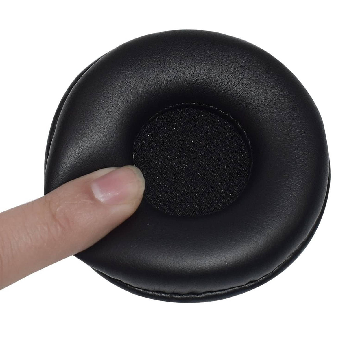 Black ear pad cushion cover close-up, foam insert with textured fabric