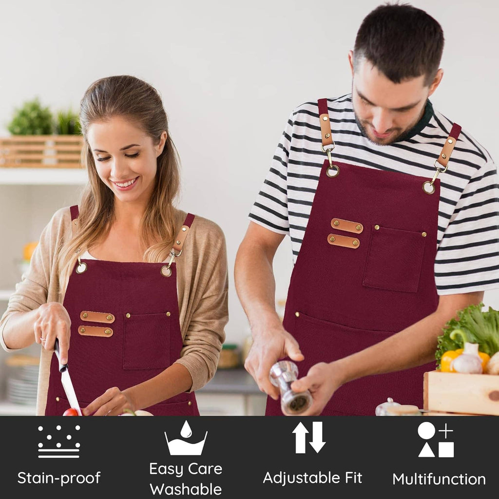 Burgundy canvas chef apron with adjustable straps, front pocket, and tool loops on wearer