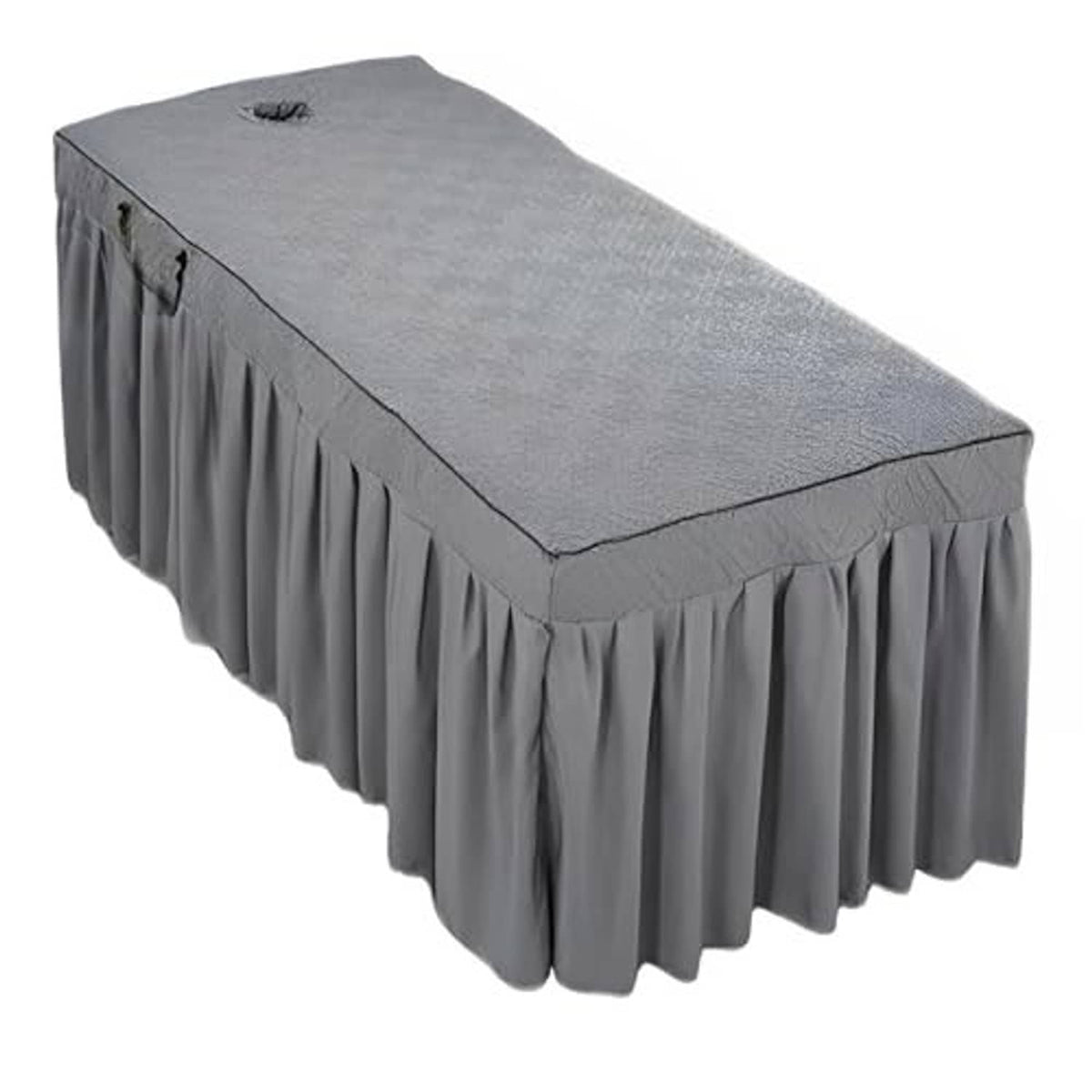 Grey massage table skirt with pleated drape and quilted top panel for the table