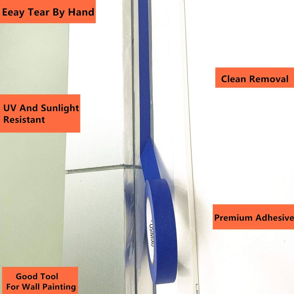 Blue painter’s tape applied along a window frame edge for clean removal.