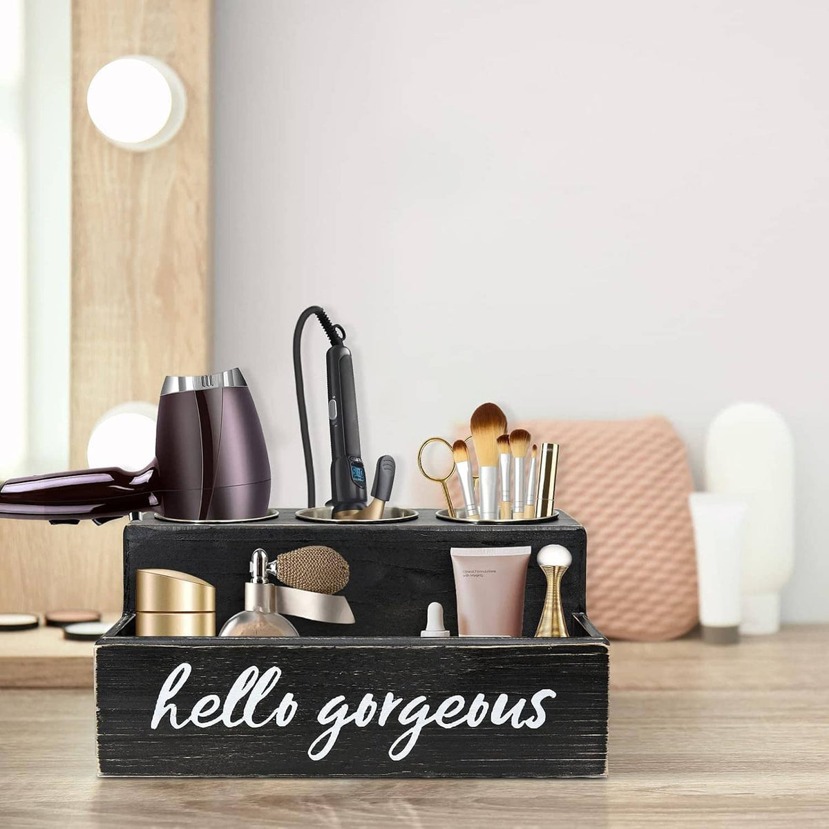 Black hair tool organizer caddy with brush set, blow dryer, and bottle containers