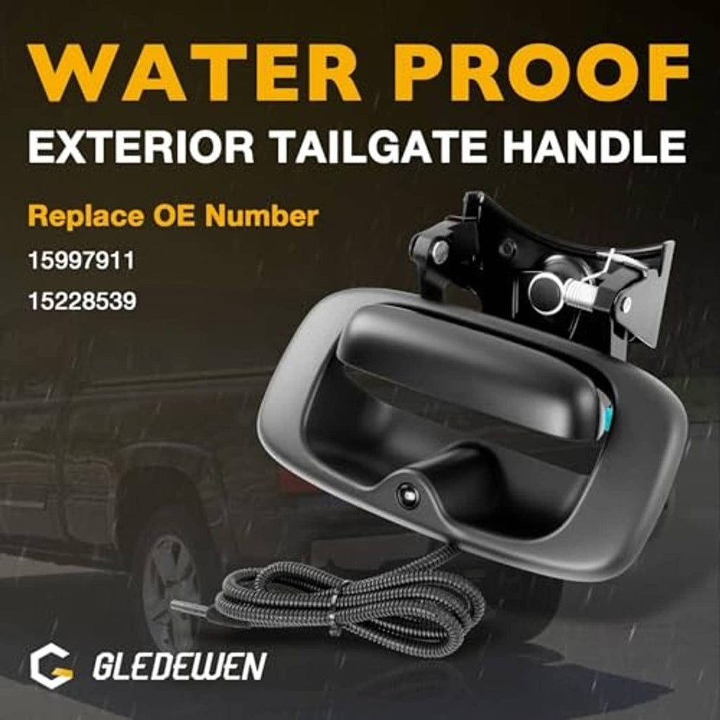 Black exterior tailgate handle with backup camera lens and coiled wiring harness