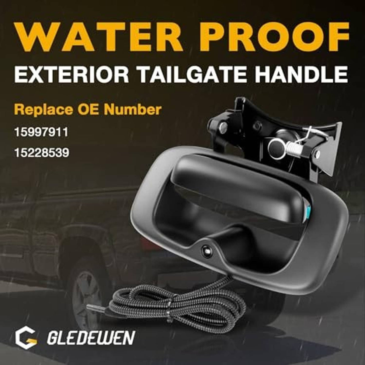 Black exterior tailgate handle with backup camera lens and coiled wiring harness