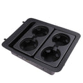 Black plastic center console cup holder bezel with four round cup openings