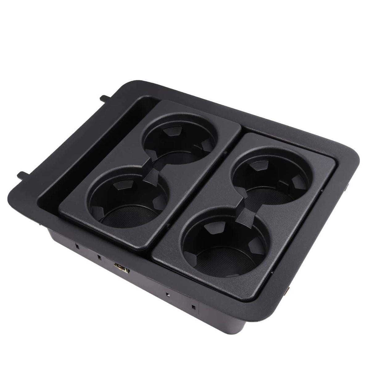 Black plastic center console cup holder bezel with four round cup openings