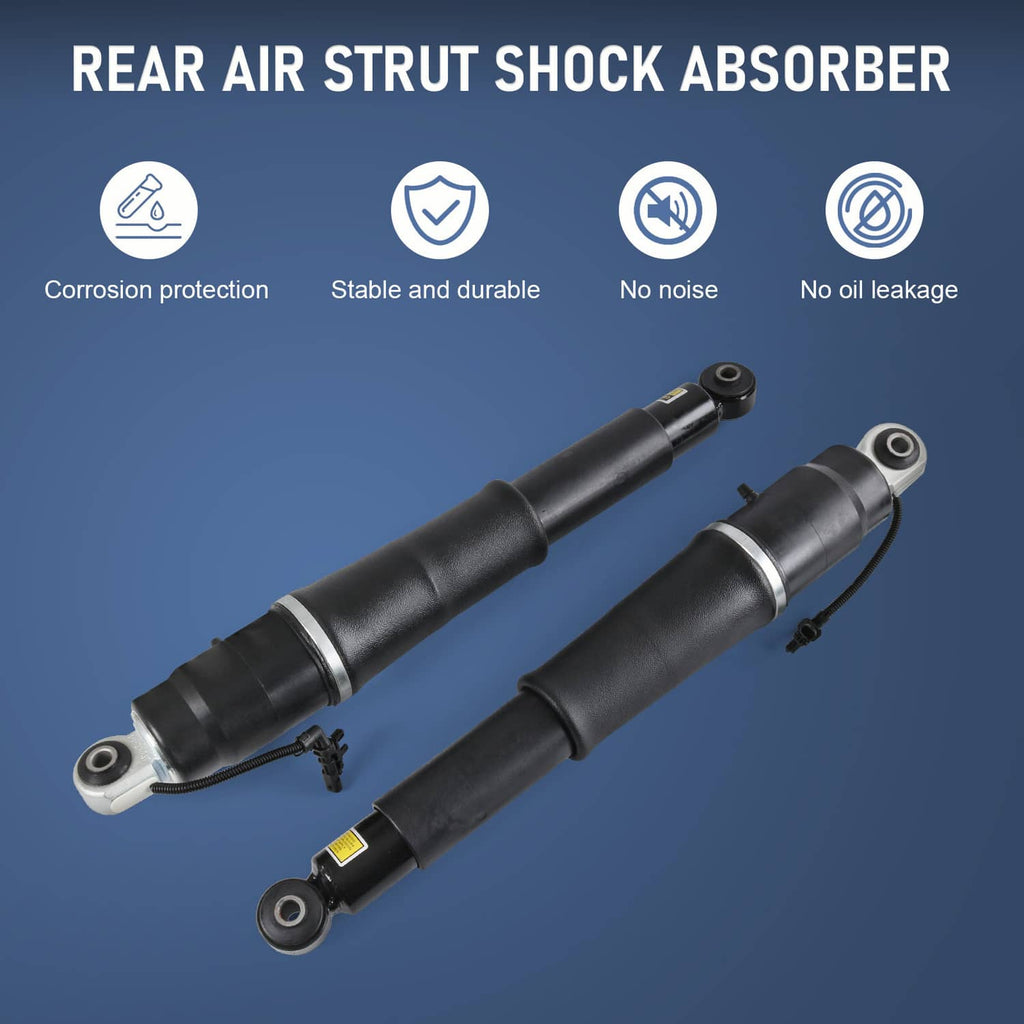Pair rear air strut shock absorbers, black cylinders with top fittings and electrical leads