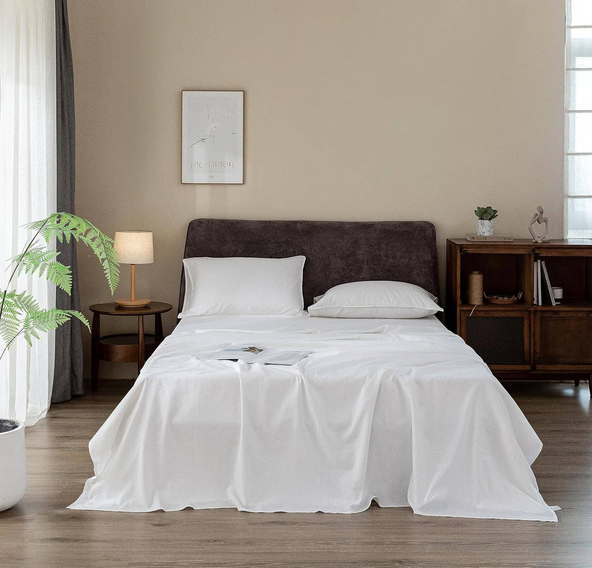 White linen bed sheets set with fitted sheet, flat sheet, and two pillowcases