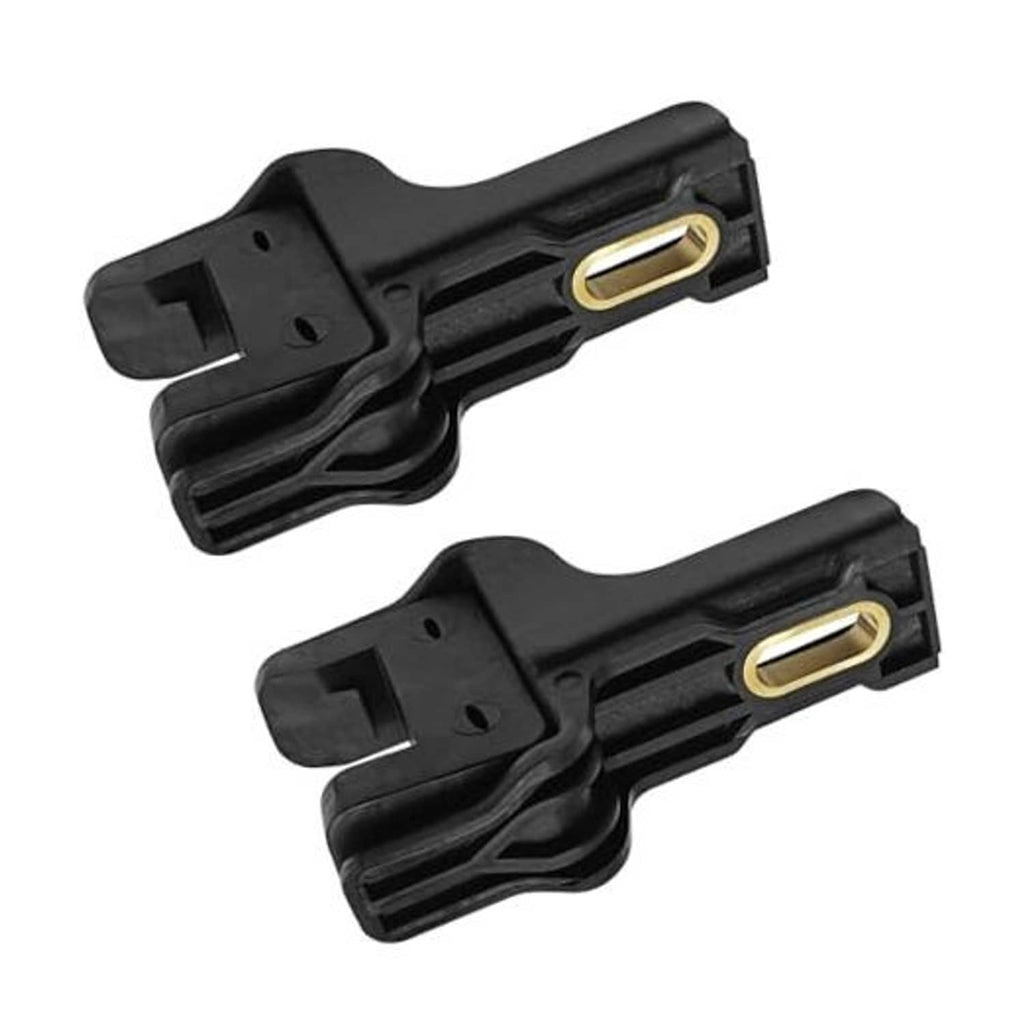 Close-up: black upper radiator bracket insulators with gold-toned metal inserts