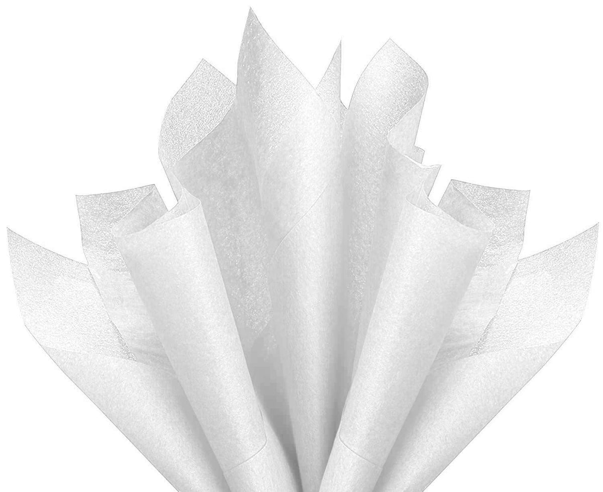 White tissue paper sheets fanned into a flower bouquet for party decoration