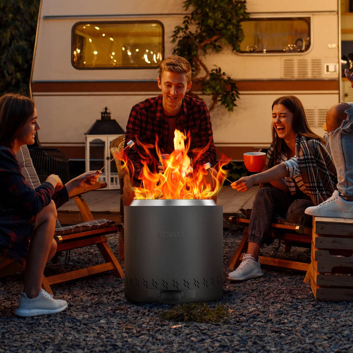 Wood-burning fire pit stove with open flames and vented sides