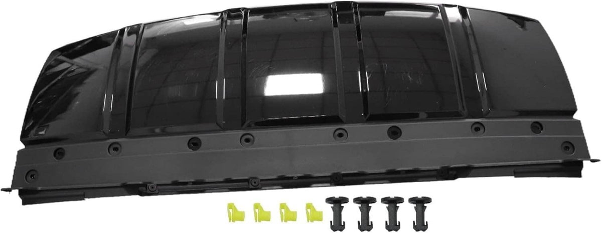 Black front bumper skid plate trim panel with visible screw hardware