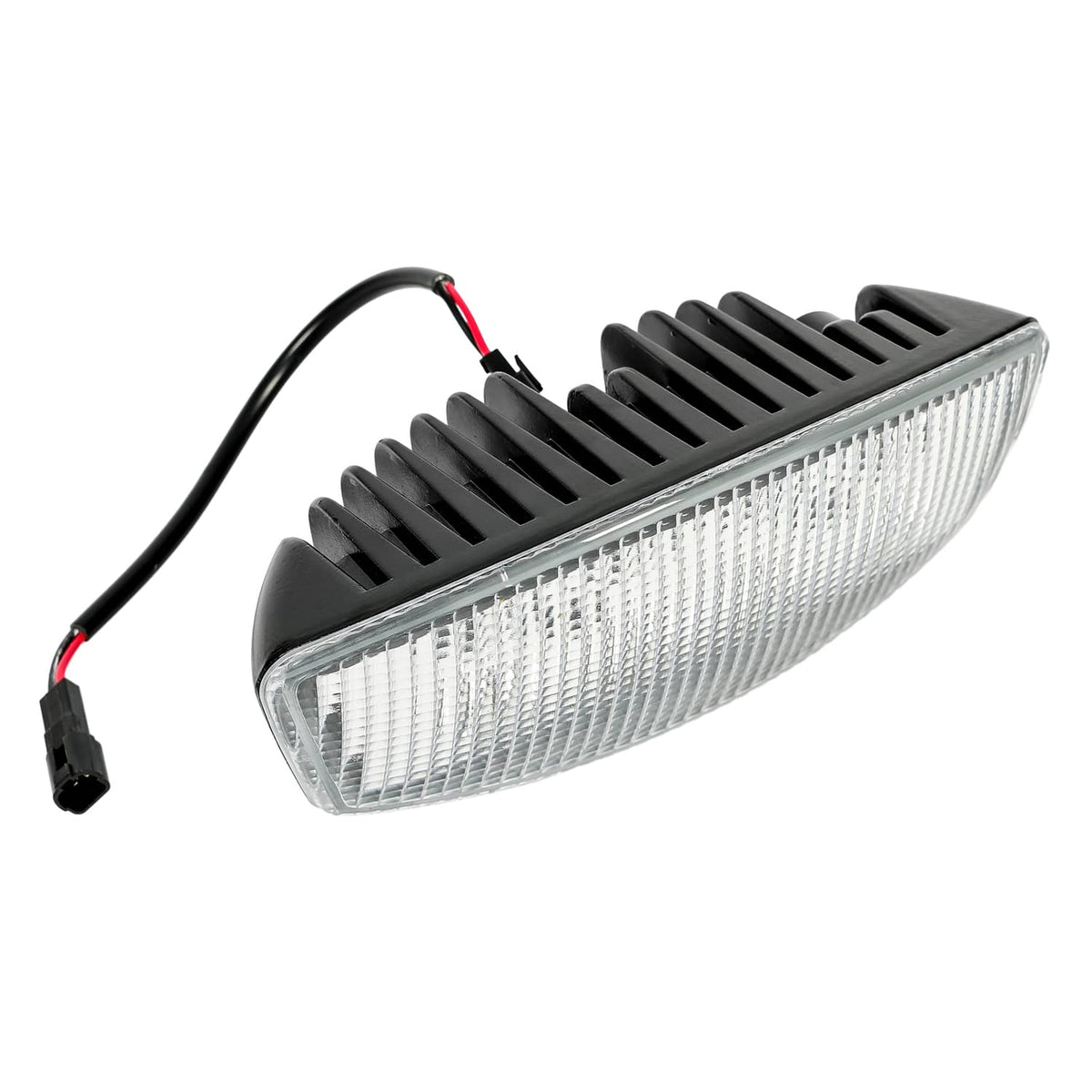 LED cab roof marker light with black fin housing, clear lens, wiring and connector on side