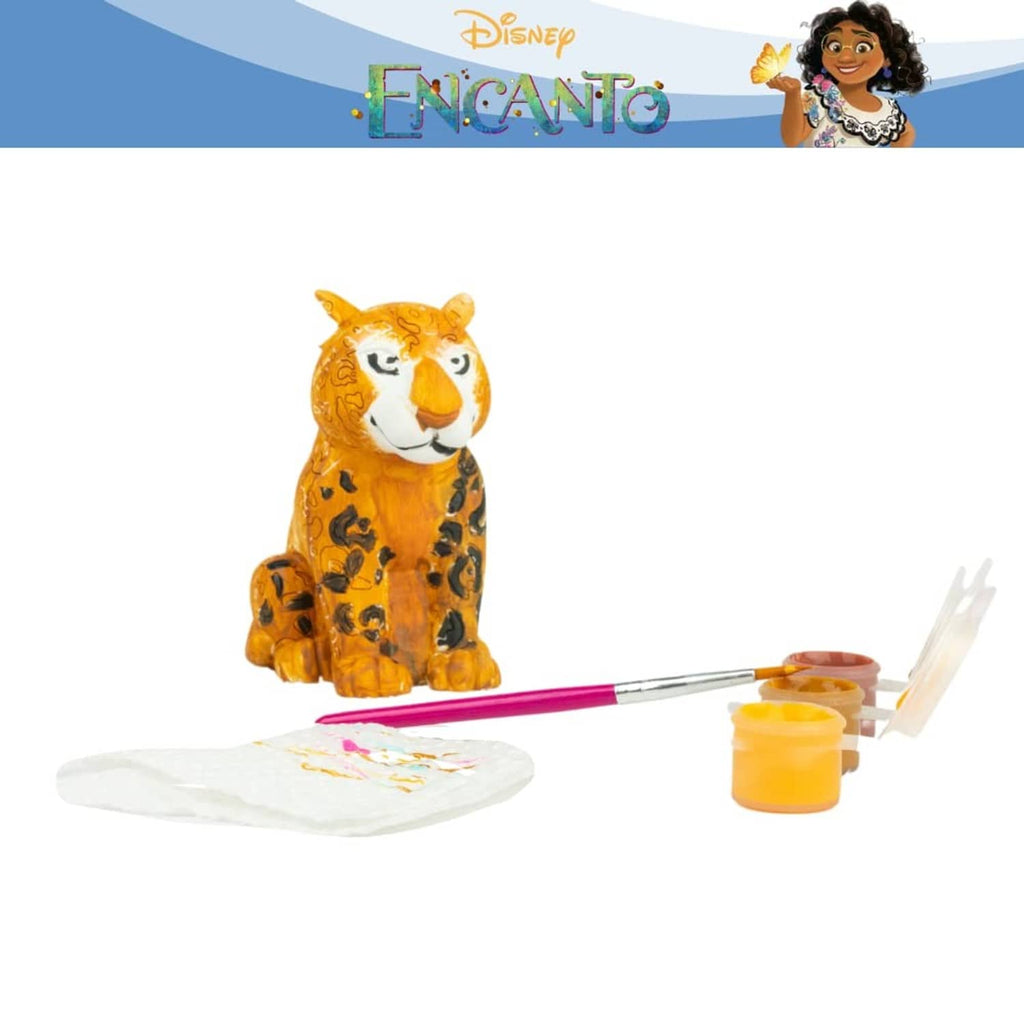Painted tiger figurine with paint brush, paint pot, and white crafting sheet