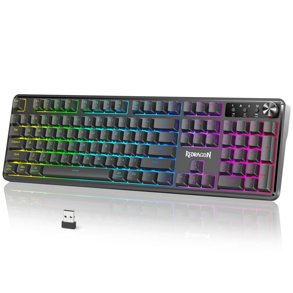 Grayish-black wireless gaming keyboard with RGB backlit keys and volume knob.