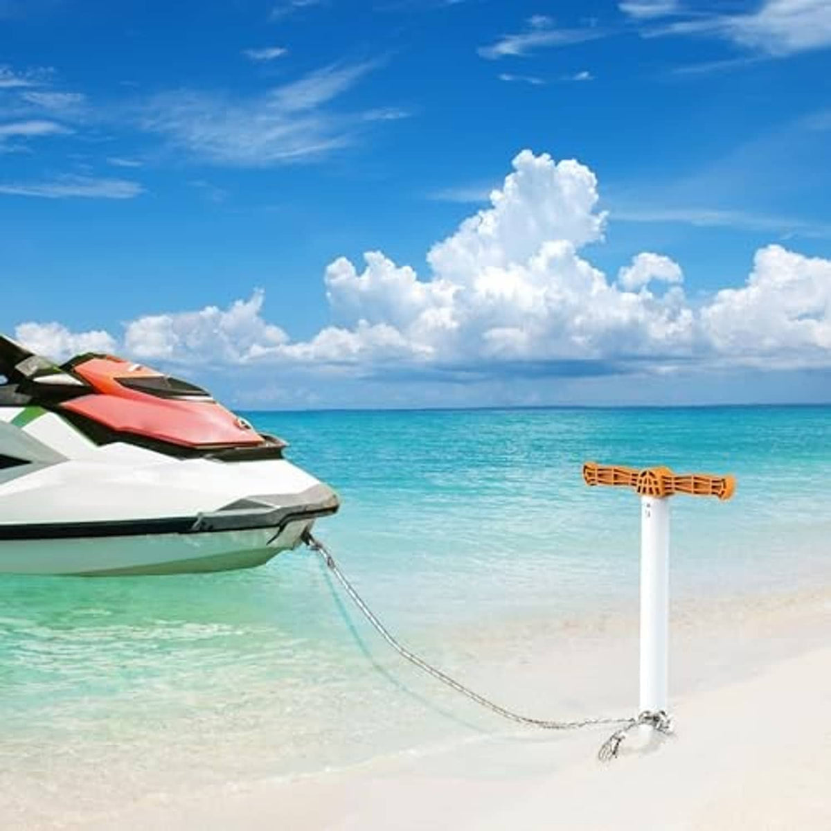 Orange sand auger anchor mounted to PVC pipe with metal chain and anchor rings