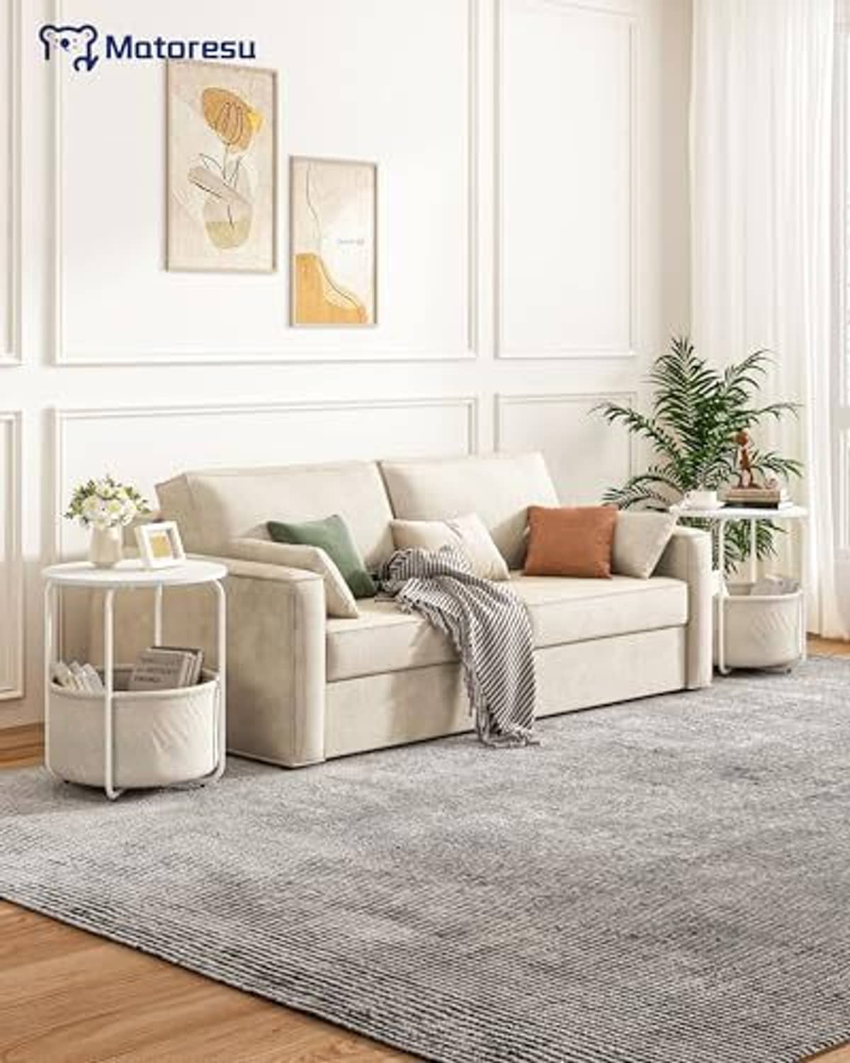 White round side table with beige fabric storage drum and open top beside sofa