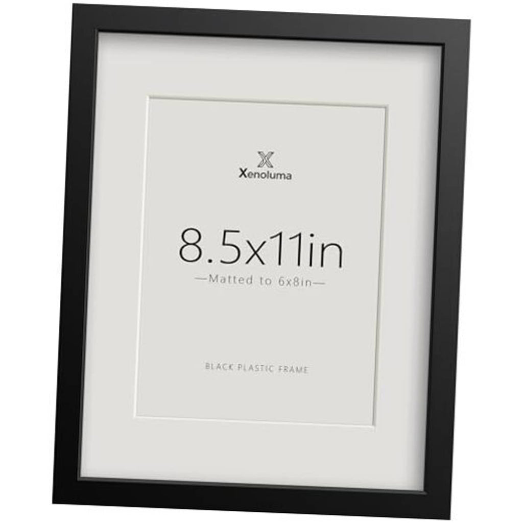 Black plastic picture frame with white mat, holds 8.5x11 artwork.