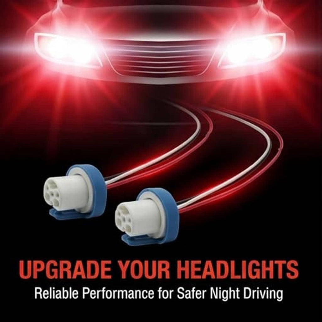 Two headlight wiring harness plugs with blue collars and white 3-pin ceramic sockets