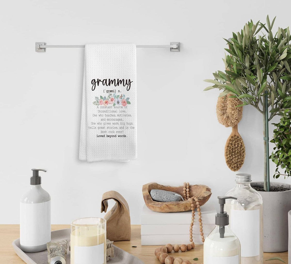 White kitchen towel with textured weave and 'grammy' floral quote print