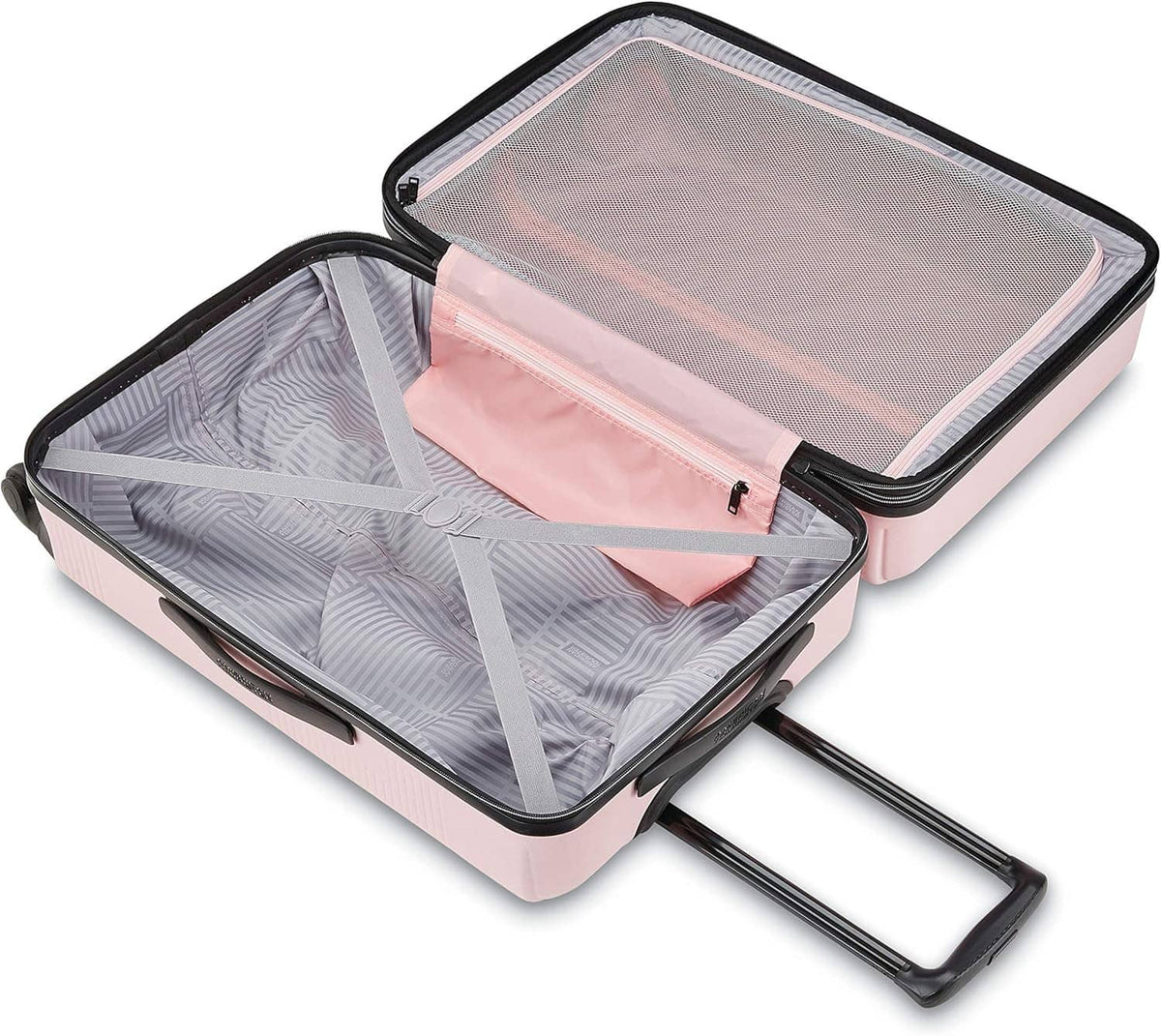 Pink hard-shell luggage opened flat with mesh divider and elastic interior straps