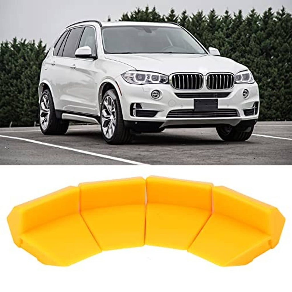 Four-piece yellow jaw clamp protector insert set, curved molded shapes.