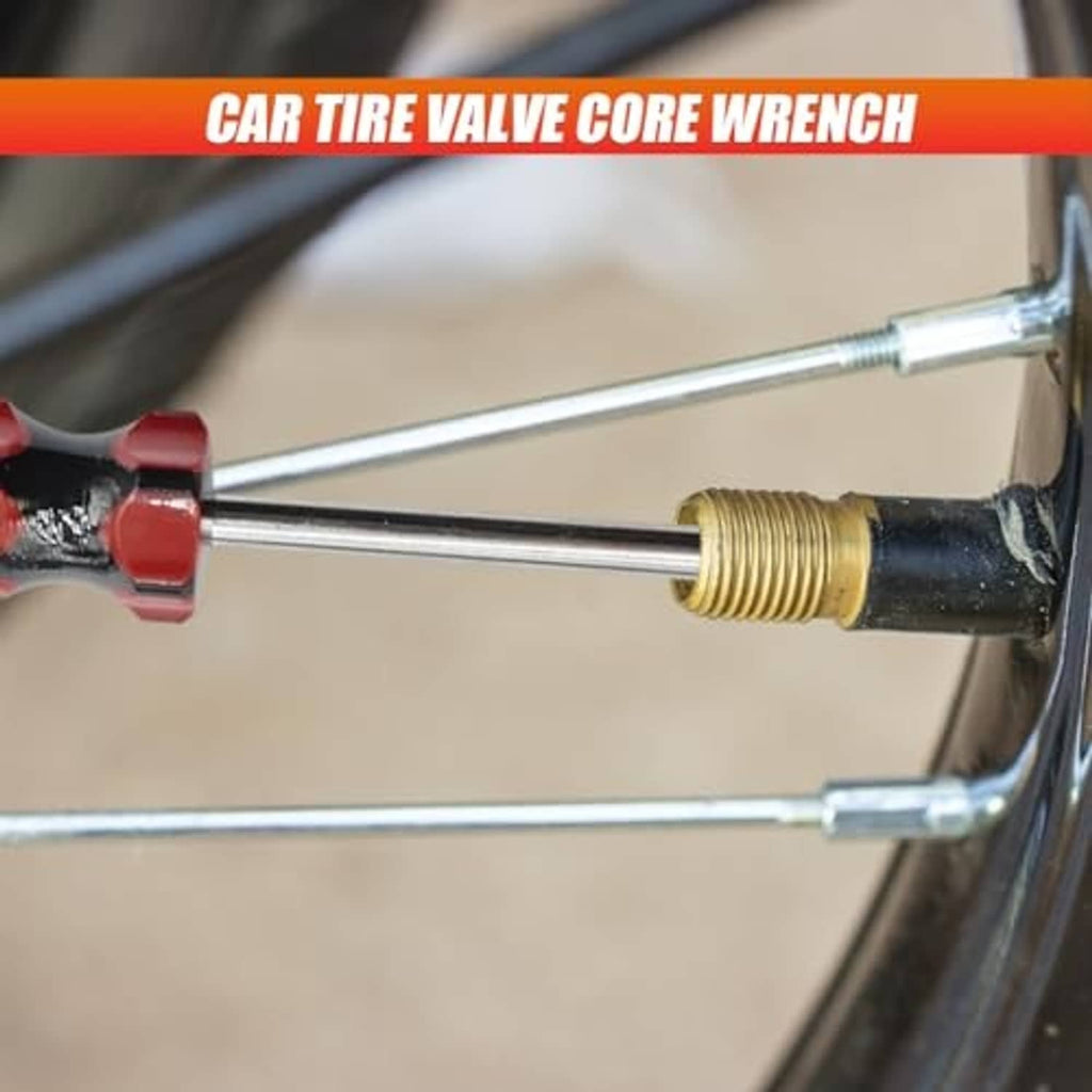 Chrome valve core wrench removing a valve core from a car tire valve stem